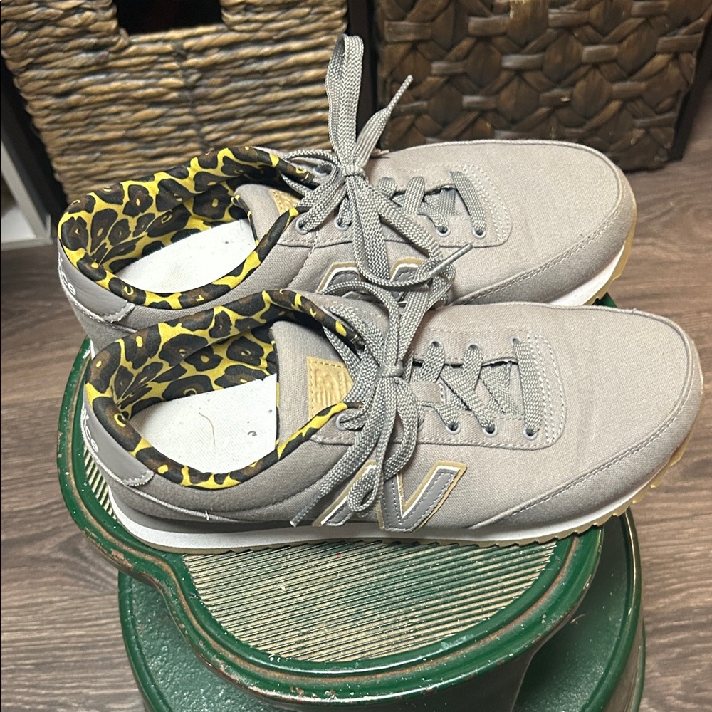 New Balance Gray Athletic Shoes with Yellow Accents